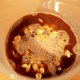 coffee and chocolate milk mixed with dry oatmeal in container